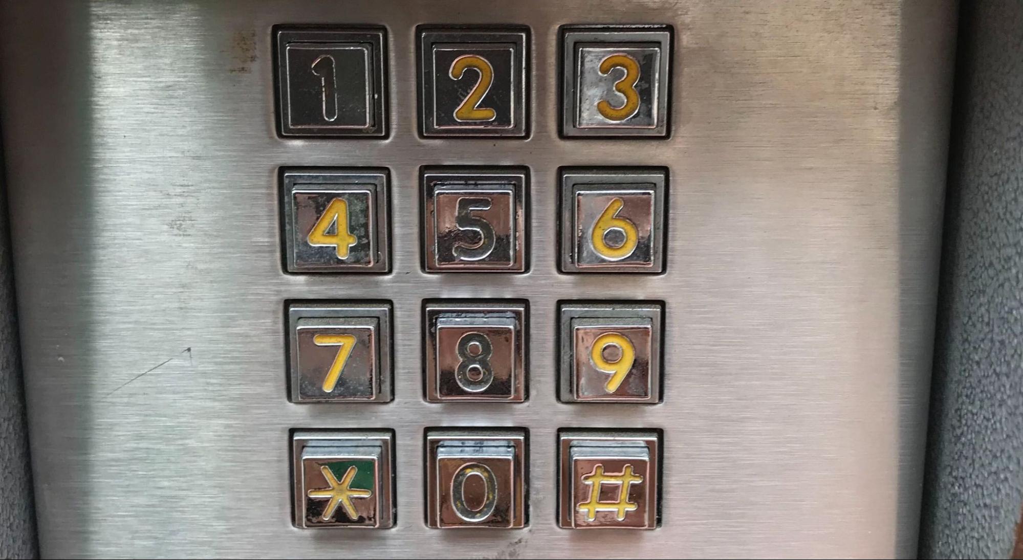 a numeric access keypad of which the paint on the numbers 1, 5, 8 and 0 are worn off.  Source.