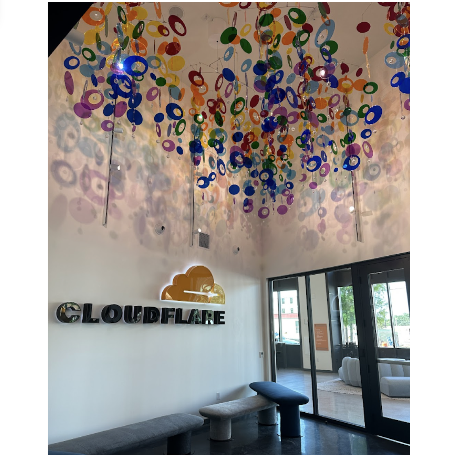 Hanging rainbow mobiles in Cloudflare’s Austin office.